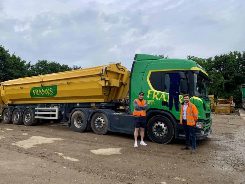 J&J Franks Team Standing Beside Lorry